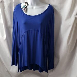 NWT.  Charlie Paige.  Amazing Royal Blue Top with an Arching Bodice.  Size S/M